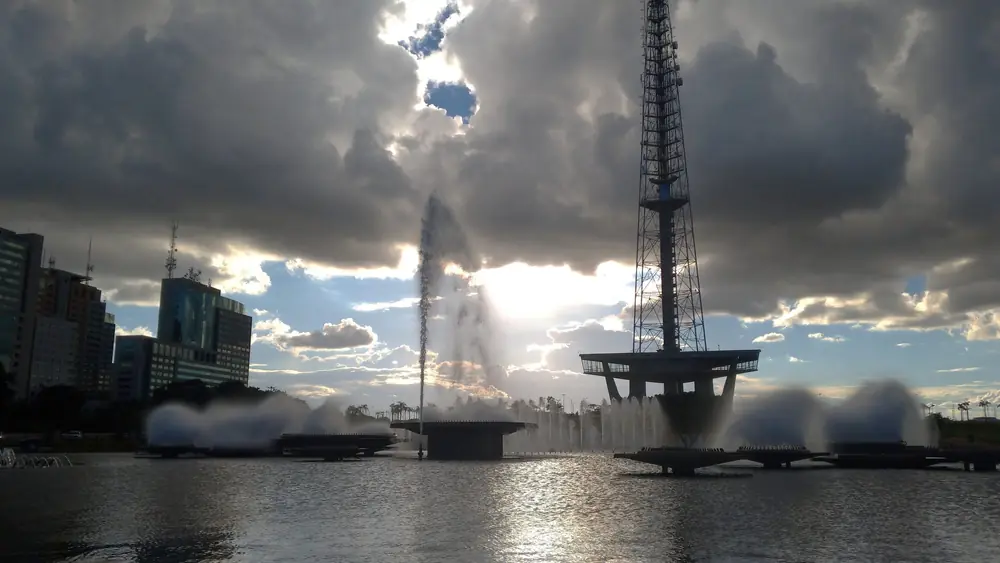 Brasília TV Tower at sunset, with a fountain in the foreground