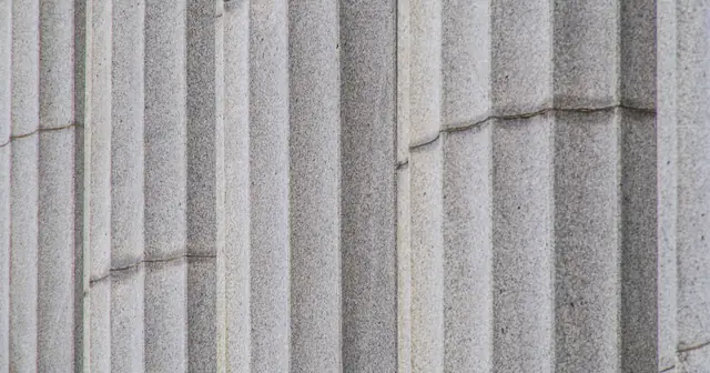 Close-up of the stone columns of a public building
