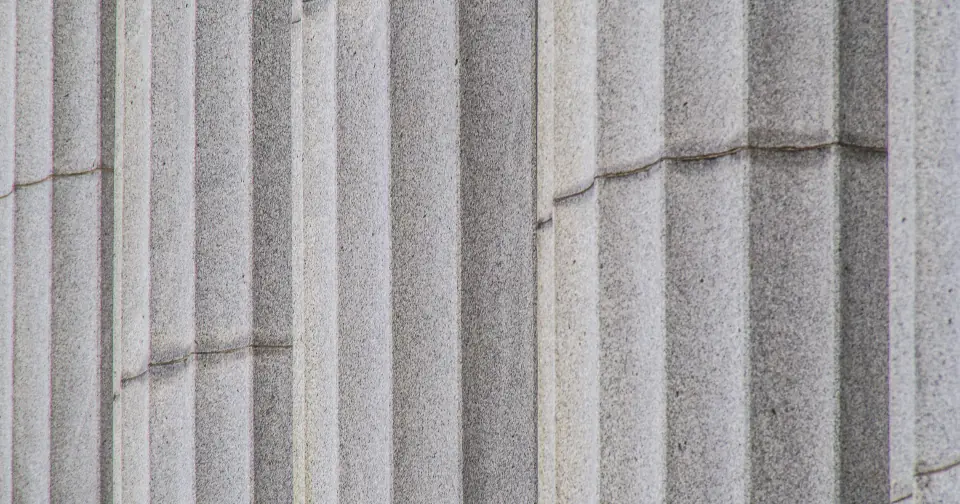 Close-up of the stone columns of a public building