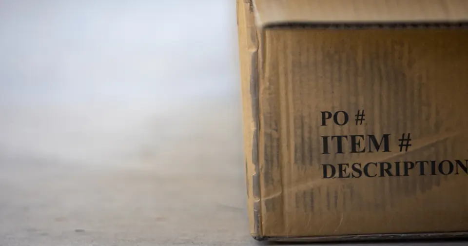 Cardboard box printed with order, item and description fields